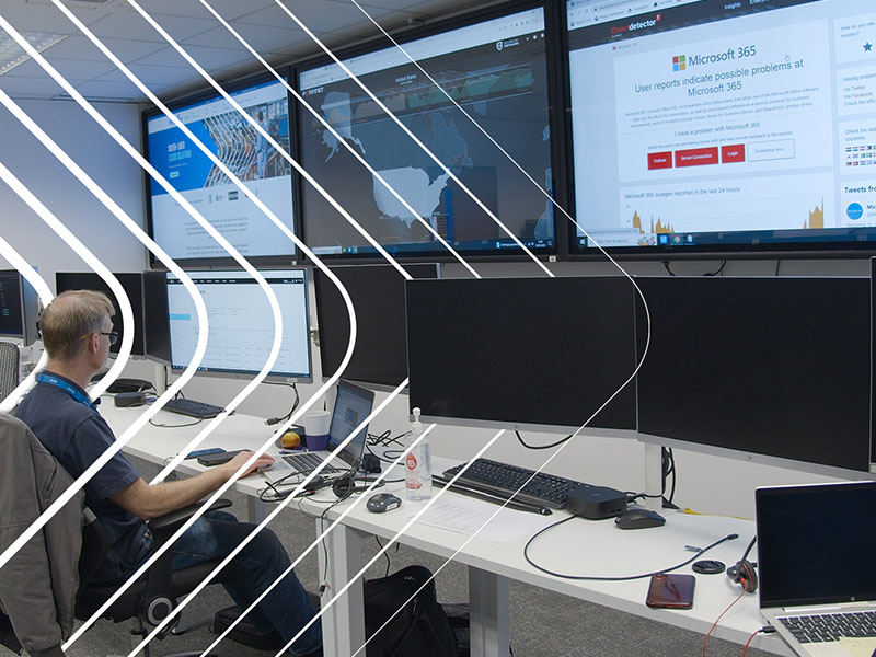 bank of computer screens, people power, feature