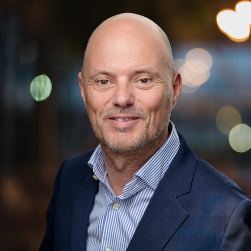 Phil Bindley Headshot Background (1)